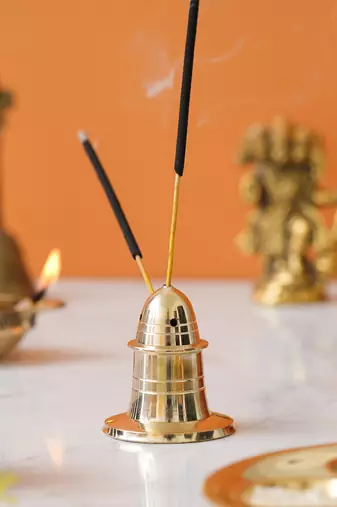 One golden brass incense stick holder agarbatti stand