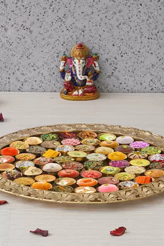 One golden metal handcrafted floral designer 56 bhog thali for pooja