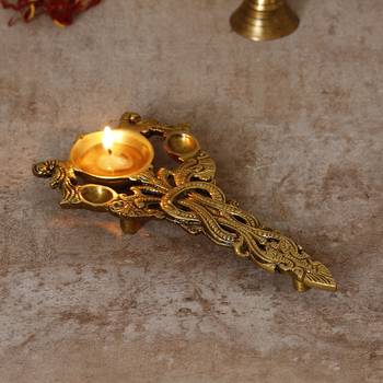 One ethnic carved 7.5 inch brass diya for pooja room and temples 1