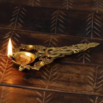 One ethnic carved 7.5 inch brass diya for pooja room and temples 2