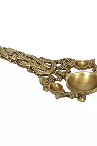 One ethnic carved 7.5 inch brass diya for pooja room and temples