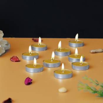 One set of 10 lemon scented tea light candles 1