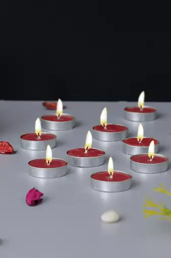One set of 10 strawberry scented tea light candles