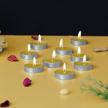 One set of 10 vanilla scented tea light candles 1