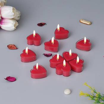 One set of 10 heart shaped rose scented tea light candles 1