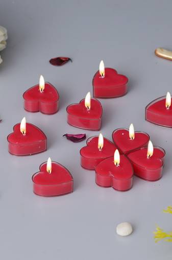 One set of 10 heart shaped rose scented tea light candles
