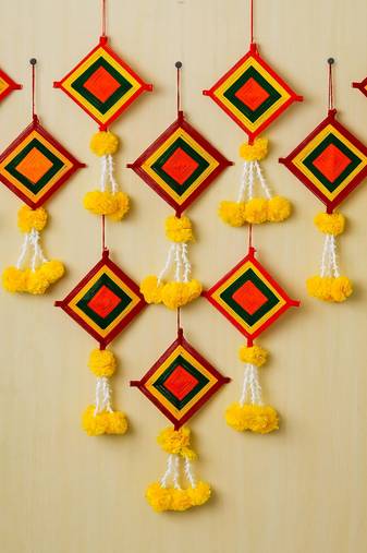 Pack of 10 artificial marigold flowers with colorful woolen kite hangings