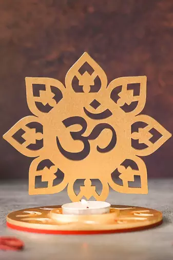 One golden mdf wooden om shadow decorative tea light candle holder diya stand