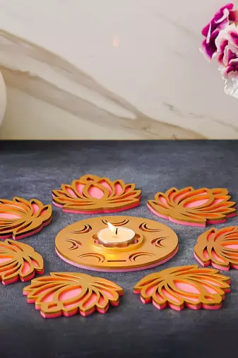 Golden pink wooden cut out lotus flower rangoli showpieces