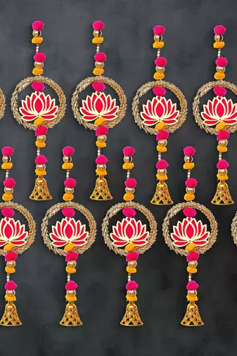 Pack of 10 lotus in golden rings with pom pom, bell hangings toran