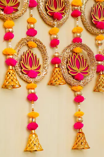 Pack of 10 lotus in golden rings with pom pom, bell hangings toran