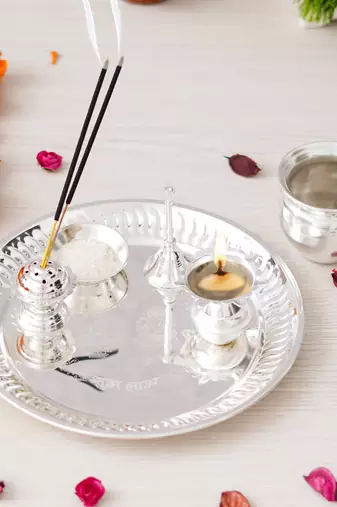 One silver pooja thali set with diya, ghanti, kalash, spoon, agarbatti stand, bowl