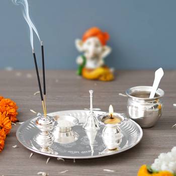 One silver pooja thali set with diya, ghanti, kalash, spoon, agarbatti stand, bowl 4
