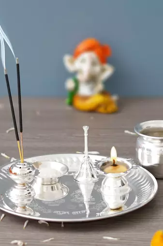 One silver pooja thali set with diya, ghanti, kalash, spoon, agarbatti stand, bowl