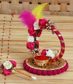 One handcrafted decorative roli tikka holder with designer stick and colorful feathers