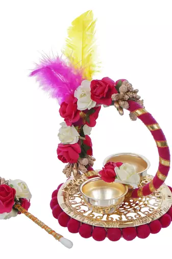 One handcrafted decorative roli tikka holder with designer stick and colorful feathers