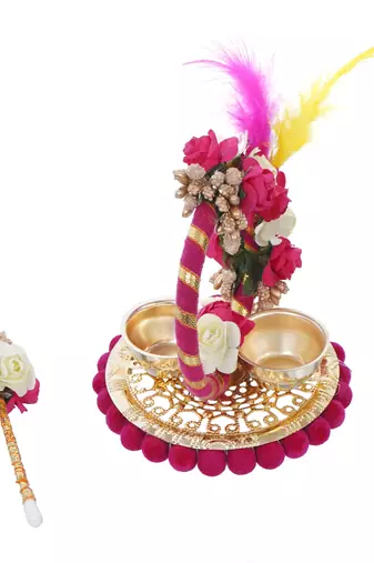 One handcrafted decorative roli tikka holder with designer stick and colorful feathers