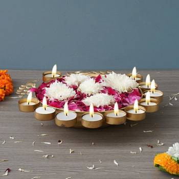 One golden metal traditional peacock designer urli with 11 tea light holders 4