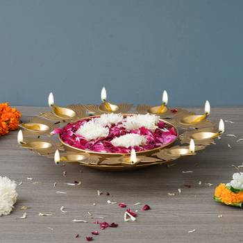 One golden metal handcrafted traditional designer urli with 9 lotus shape diyas 4