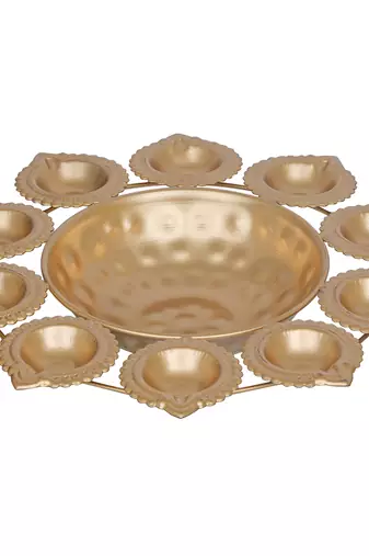 One golden metal handcrafted designer urli with 10 diyas