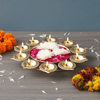 One golden metal handcrafted designer urli with 10 diyas 4