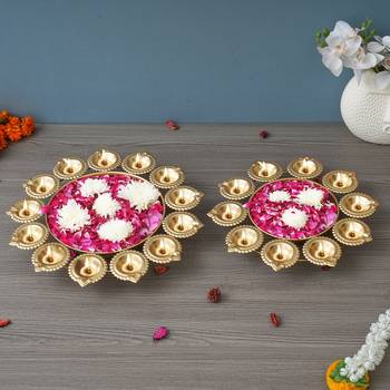 One set of 2 golden metal handcrafted flower shape designer urlis with diyas 1