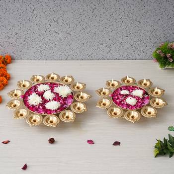 One set of 2 golden metal handcrafted flower shape designer urlis with diyas 2
