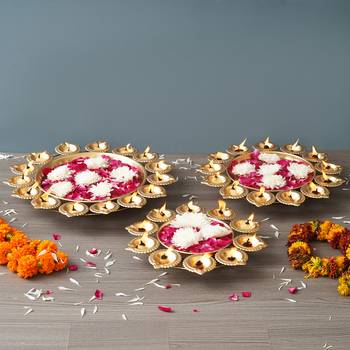 One set of 3 golden metal handcrafted flower shape designer urlis with diyas 1