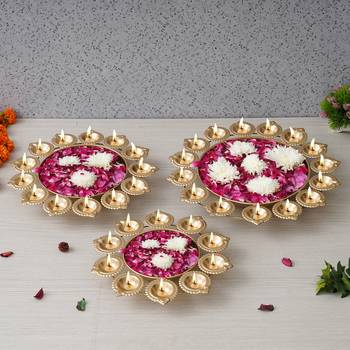 One set of 3 golden metal handcrafted flower shape designer urlis with diyas 2