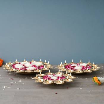 One set of 3 golden metal handcrafted flower shape designer urlis with diyas 4