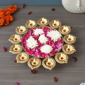 One golden metal handcrafted designer urli with 13 diyas 1