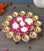 One golden metal handcrafted designer urli with 13 diyas