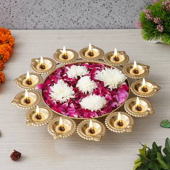 One golden metal handcrafted designer urli with 13 diyas 2