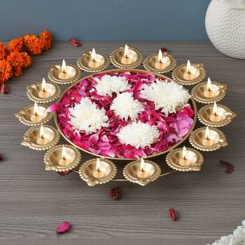 One golden metal handcrafted designer urli with 15 diyas 1