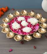 One golden metal handcrafted designer urli with 15 diyas