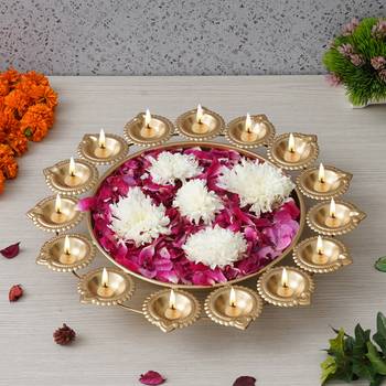 One golden metal handcrafted designer urli with 15 diyas 2