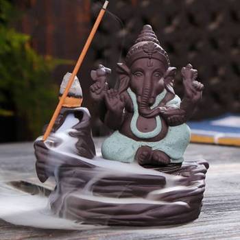 One green lord ganesha decorative showpiece with 10 free smoke backflow scented cone incenses 1