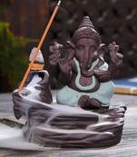 One green lord ganesha decorative showpiece with 10 free smoke backflow scented cone incenses