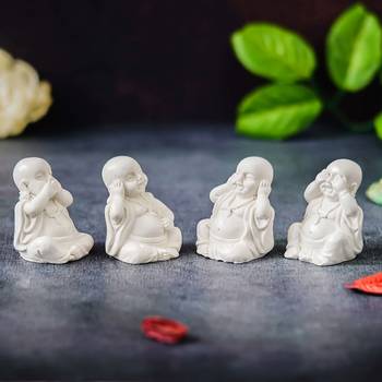 Set of 4 white baby monk buddha statues for home decoration 2