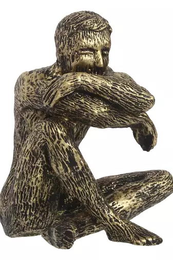 One man sitting in thinking position decorative statue