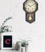 One brown plastic vertical analog pendulum wall clock