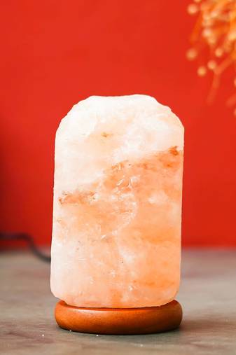 One decorative himalayan rock salt lamp with wooden base - table lamp