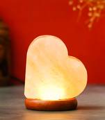 One heart shaped decorative himalayan salt lamp with wooden base - table lamp