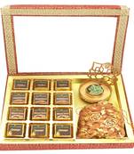12 pcs assorted chocolates, shadow ganesha t-lite and almonds pouch hamper box
