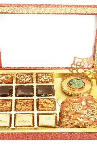 12 pcs assorted bites, shadow ganesha t-lite and almonds pouch hamper box