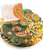 Diwali hampers-golden basket hamper of mysore pak, ,toran, rangoli and a set of 6 diyas