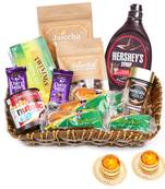 Brown cane like basket hamper  of 18 goodies with 2 t-lites