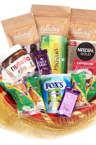Golden net basket hamper  of 20 goodies