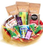 Golden net basket hamper  of 20 goodies
