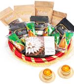 Golden net basket hamper  of 18 goodies with 2 t-lites